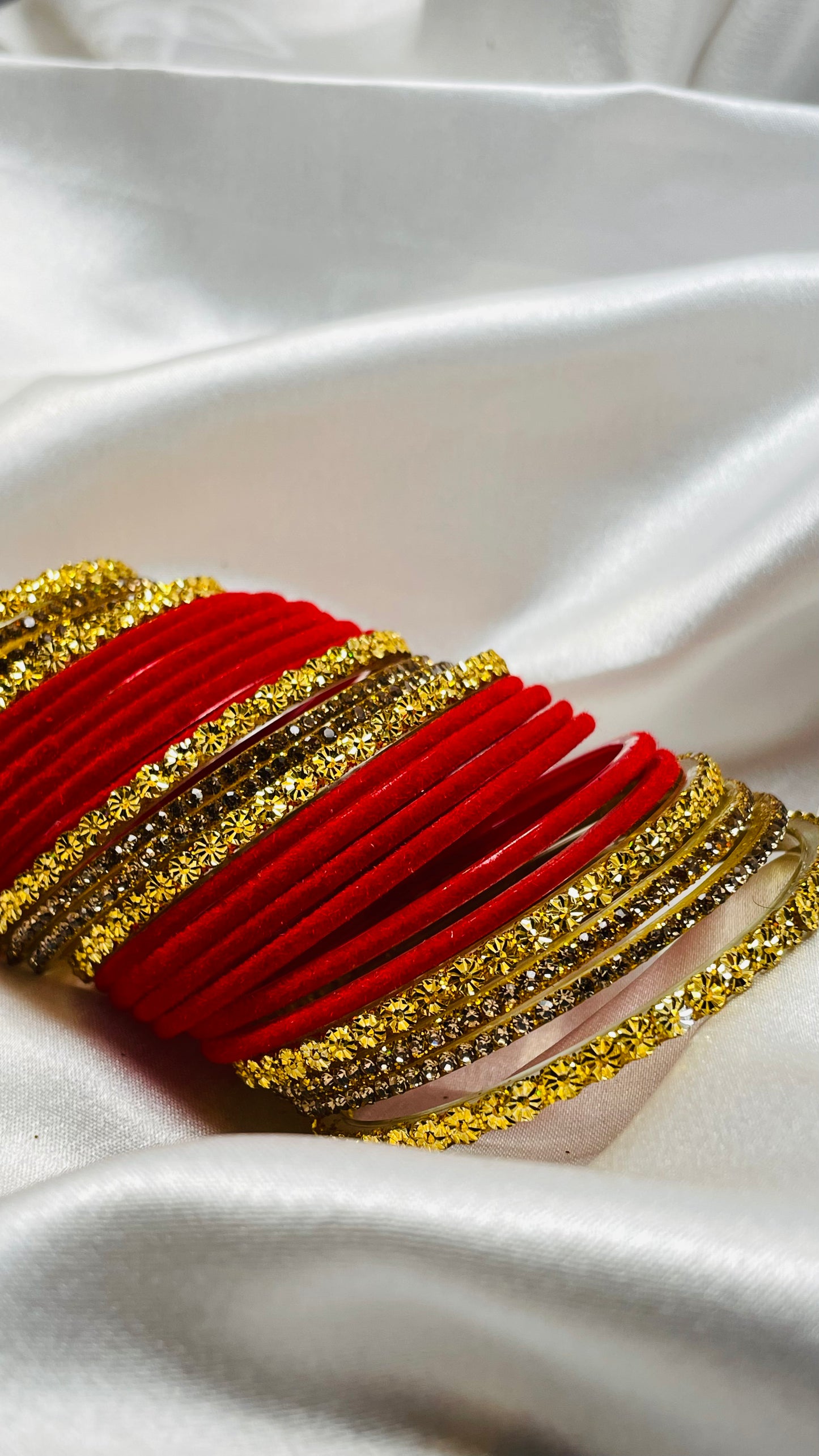 Pair Of Red Velvet With Golden Stone (Total 48 Bangles)